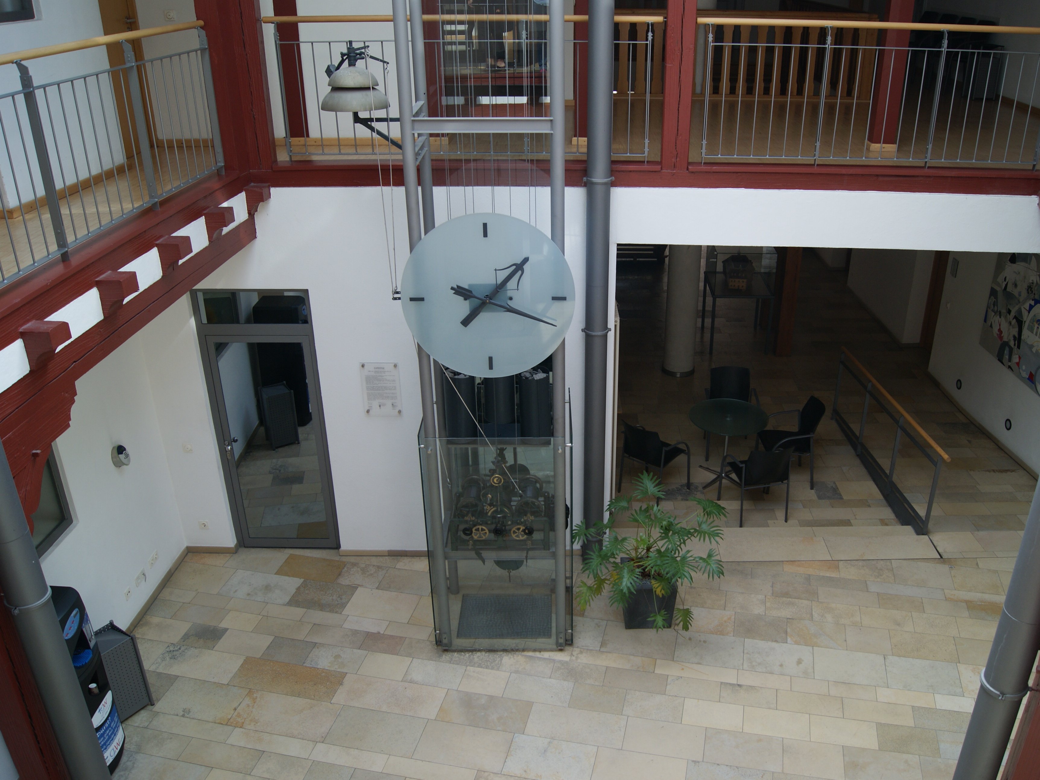 Atrium, interior in the town hall with old clock